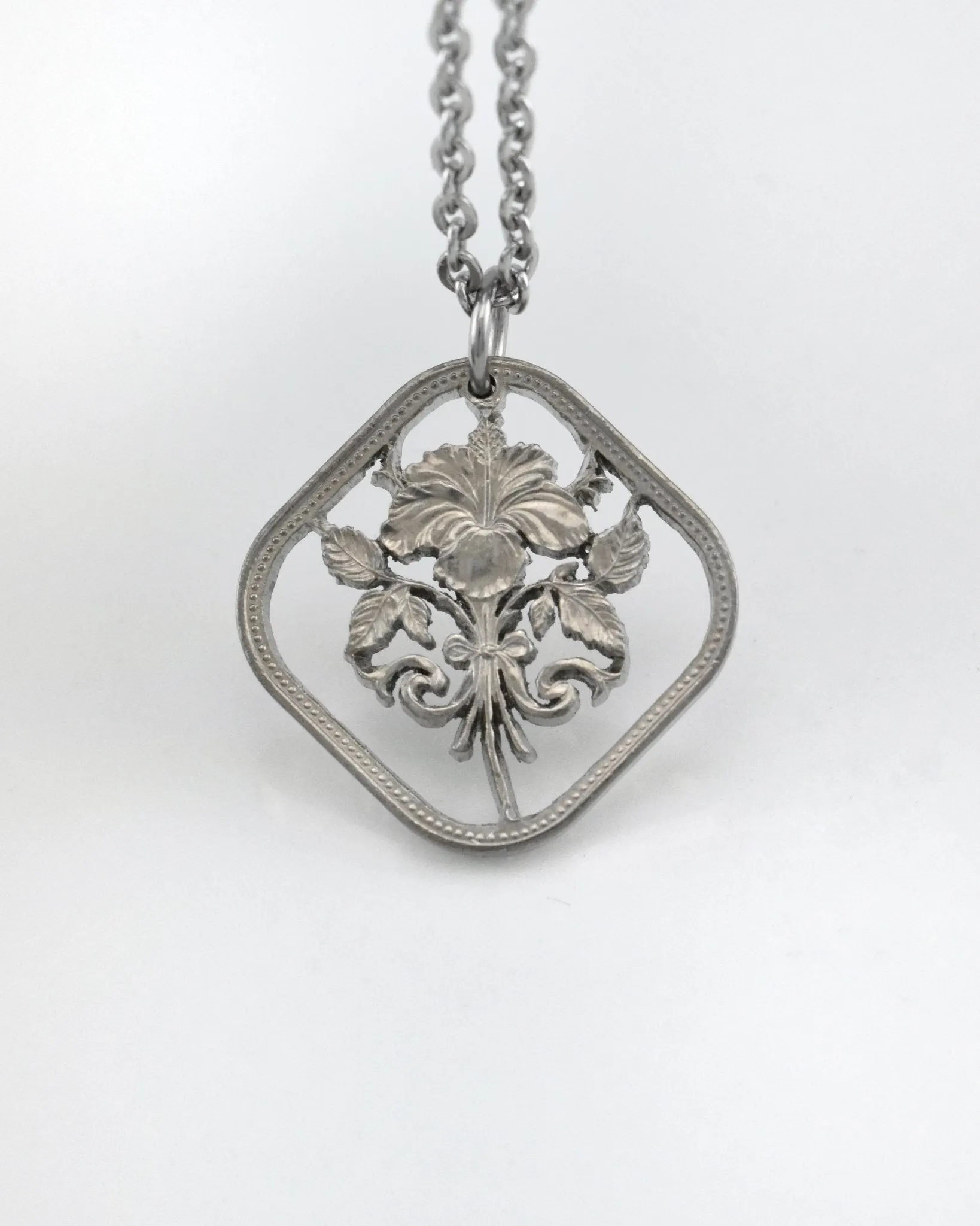 Bahamas - Hibiscus Cut Coin Pendant