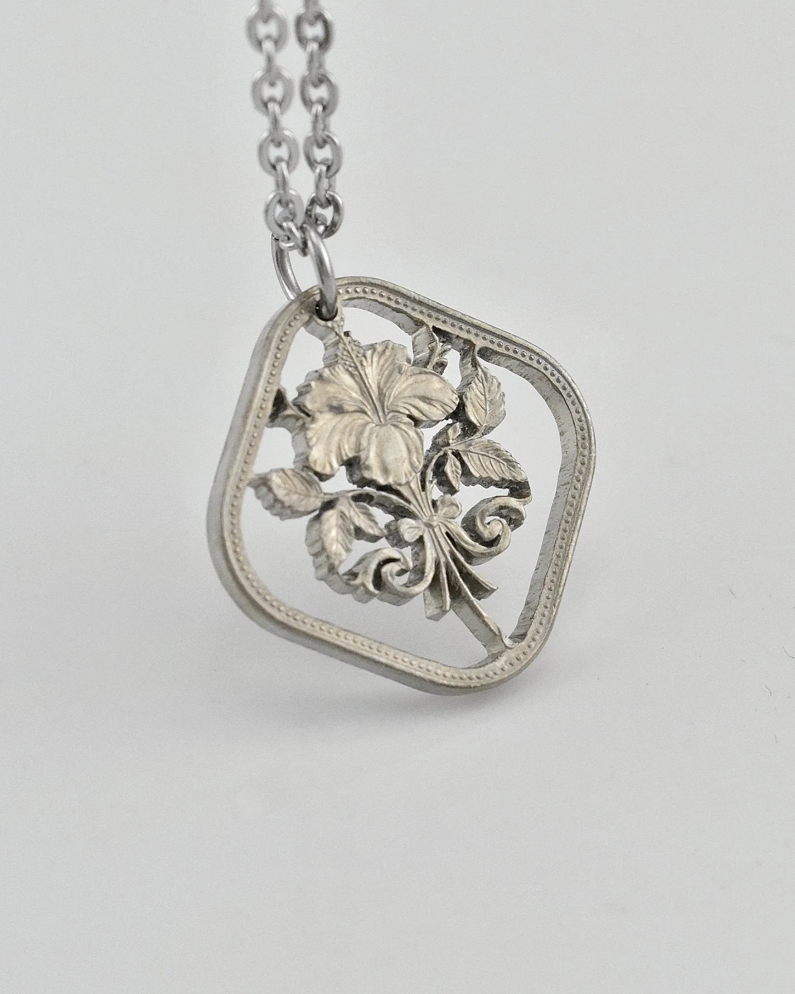 Bahamas - Hibiscus Cut Coin Pendant